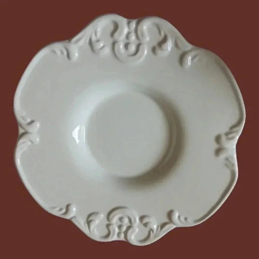 Shabby chic porcelain teacup and saucer